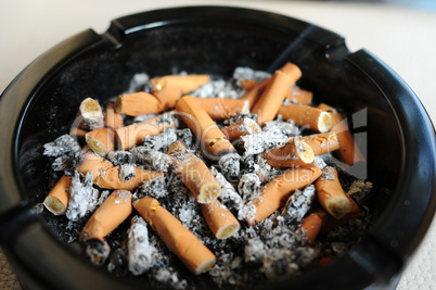 Ashtray with cigarette butts