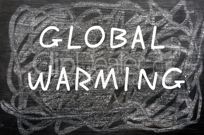 "Global Warming" written on a chalkboard
