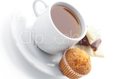 bar of chocolate,tea and muffin isolated on white