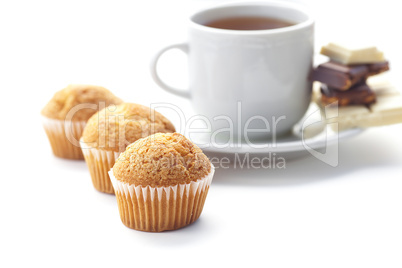 bar of chocolate,tea and muffin isolated on white