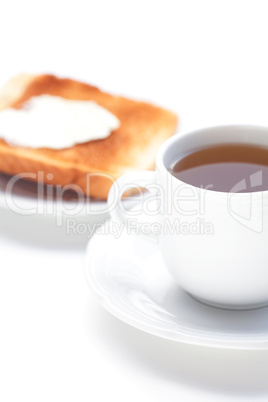 tea and toast with butter isolated on white