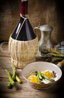 Asparagi with fried egg brown