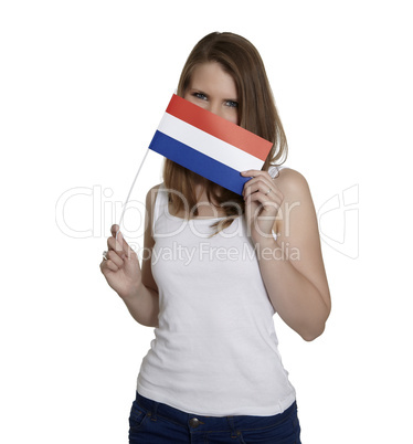 Attractive woman hides her face behind flag of the Netherlands