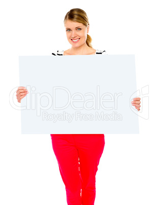 Pretty lady displaying blank placard