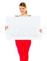 Pretty lady displaying blank placard