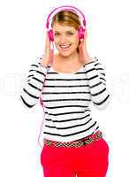 Beautiful electro pop girl enjoying music