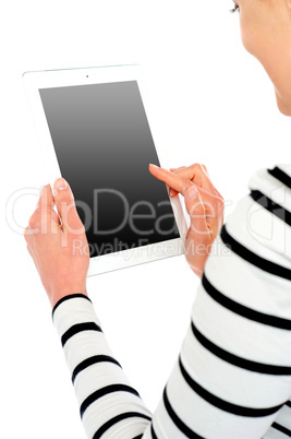 Cropped image of smiling woman using tablet pc