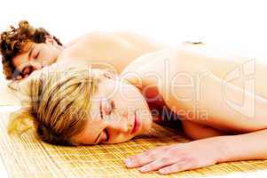 Attractive young couple on spa treatments
