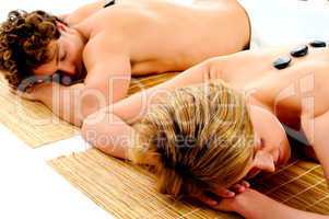 Young couple enjoying spa treatment