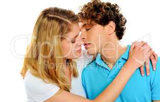 Teenage couple about to kiss each other