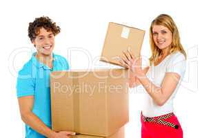 Attractive caucasian couple holding cardboard boxes