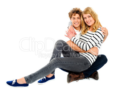 Girlfriend sitting on her partners lap