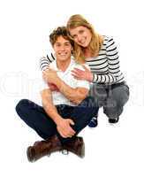 Loving couple sitting and smiling