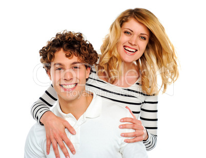 Happy woman hugging man from behind