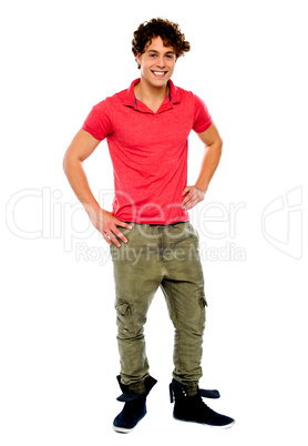 Guy posing with hands on his waist