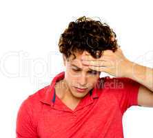 Stressed out guy with hand on his forehead