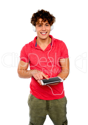 Guy enjoying music. Geek person