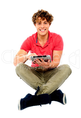 Portrait of a boy using a tablet computer