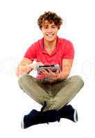 Portrait of a boy using a tablet computer