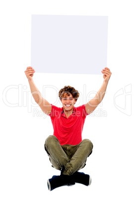 Trendy guy holding advertising board
