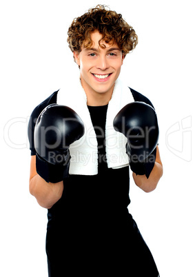 Boxer boy in sports outfit ready to punch you