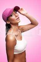Tan woman in pink cap