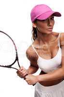 tan woman in white sportswear and tennis racquet
