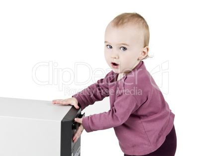 young child playing with cd