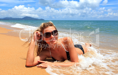 pretty woman in bikini and glasses