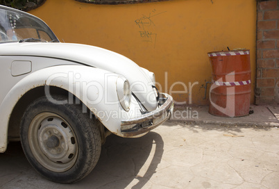 Old car on teh side of teh road in Mexico