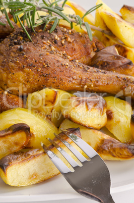 chickens roast with baking potatoes