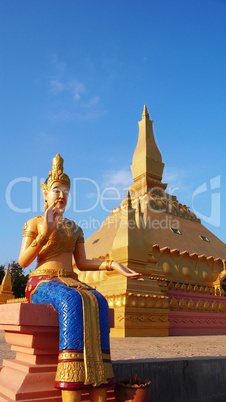 Golden Buddha sculpture and temple
