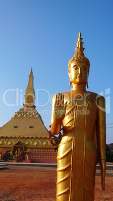 Golden Buddha sculpture and temple
