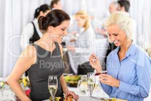 Business meeting buffet smiling woman eat dessert