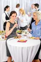 Business women drink aperitif company meeting