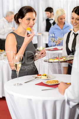 Business woman eat dessert from catering service