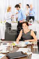 Business woman work during catering buffet