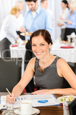 Business woman work during catering buffet