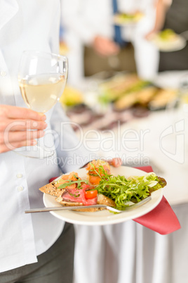 Business woman hold plate with catering food