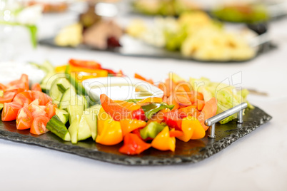 Catering table buffet vegetable salad plate