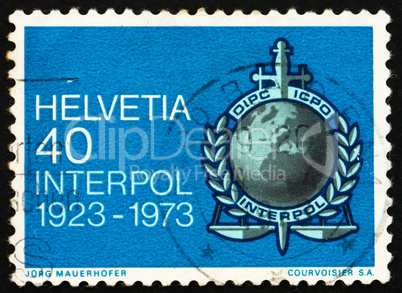 Postage stamp Switzerland 1973 Interpol Emblem