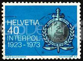 Postage stamp Switzerland 1973 Interpol Emblem