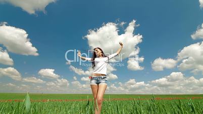 Happy Young Woman In A Field