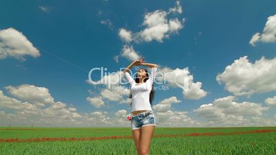 DOLLY: Happy Young Woman In A Field