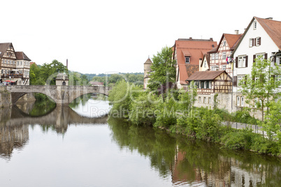 historic city in germany with river and stone bridge