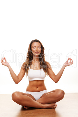 Young attractive female doing yoga