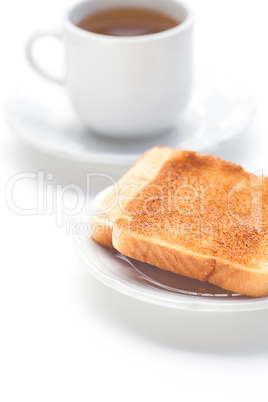 tea and toast isolated on white