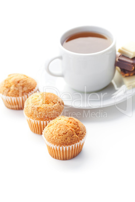 bar of chocolate,tea and muffin isolated on white