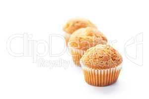three muffins isolated on white