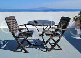 Table and chairs at Santorini, Greece